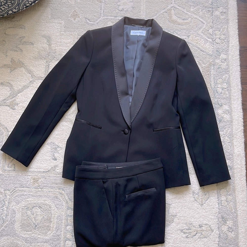 Calvin Klein Tuxedo style suit.  Satin trimmed collar and pocket trim.